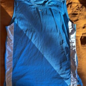 vintage Nike Center Swoosh sleeveless basketball mesh jersey in blue
